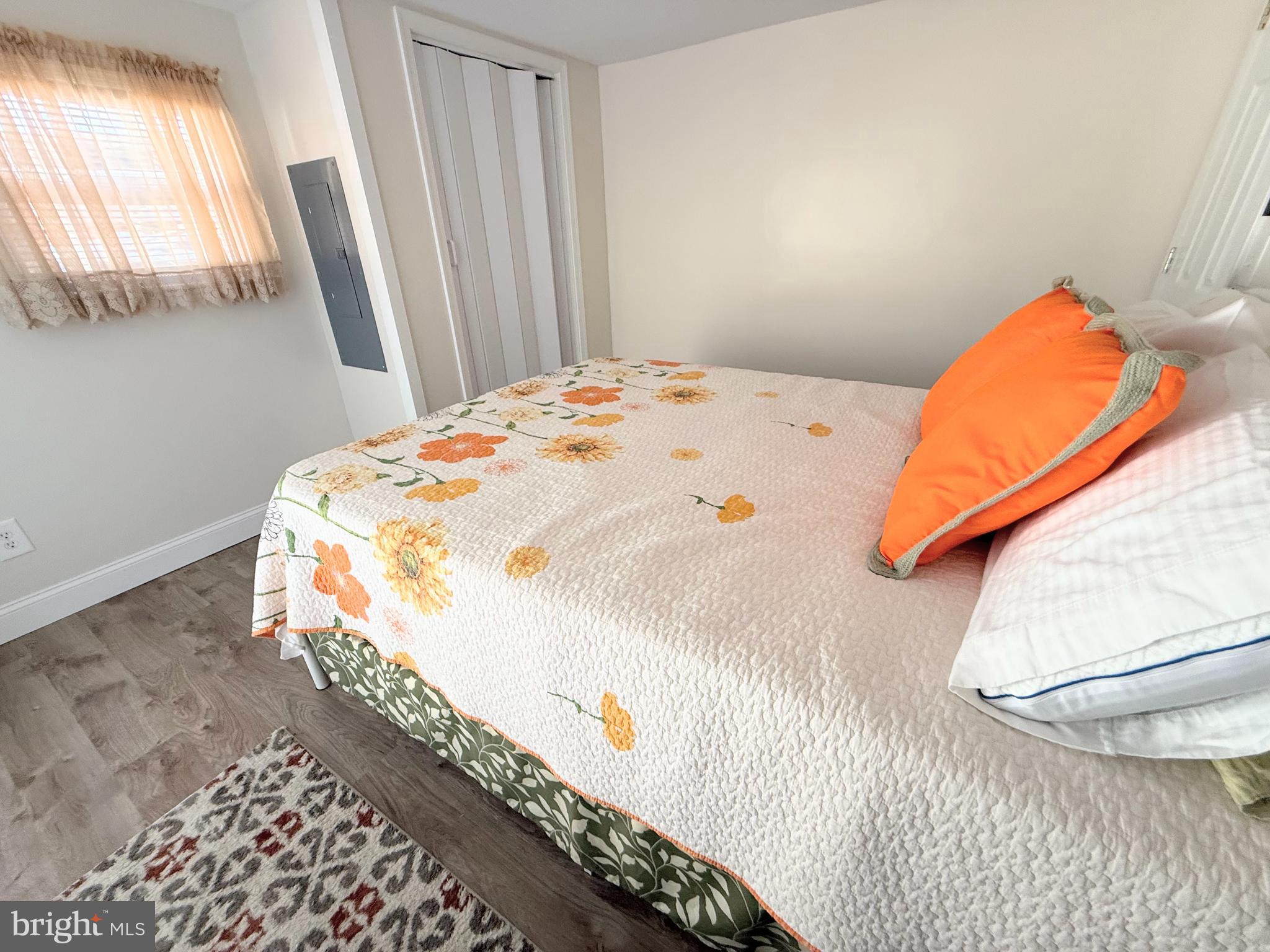 34479 Broad Water Road, Unit 644 Millsboro, DE 19966 - Photo 39 of 61 a bedroom with a bed and a window