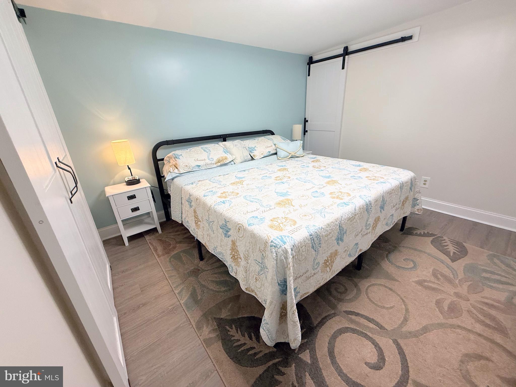 34479 Broad Water Road, Unit 644 Millsboro, DE 19966 - Photo 42 of 61 a bedroom with a bed and a window