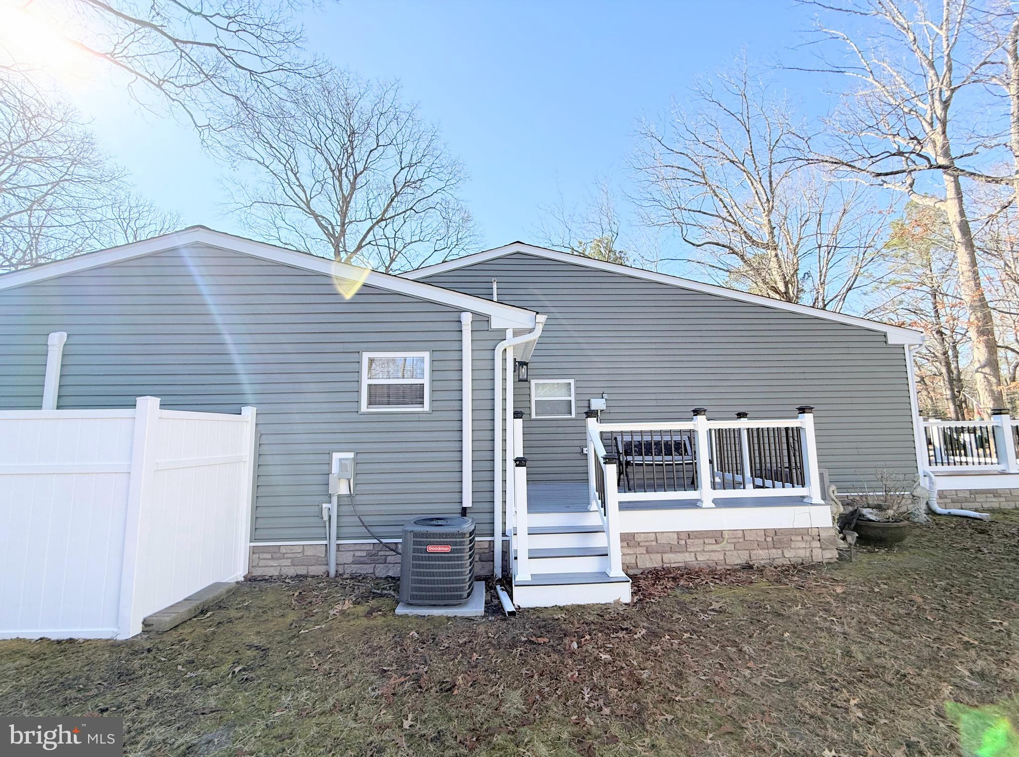 34479 Broad Water Road, Unit 644 Millsboro, DE 19966 - Photo 10 of 61 a view of a house with a backyard