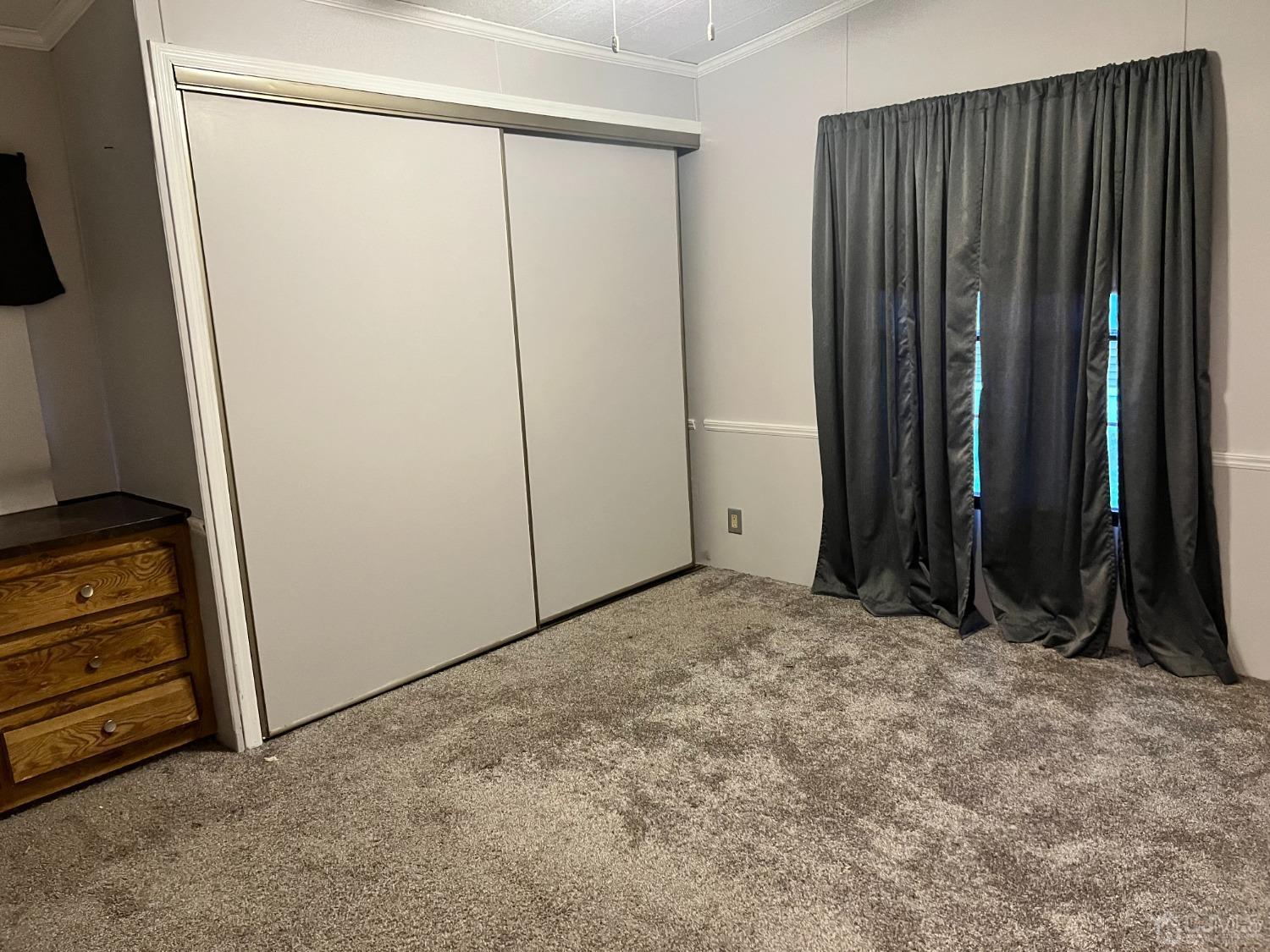 33 Poe Road North Brunswick, NJ 08902 - Photo 10 of 13 a view of an empty room with wooden floor