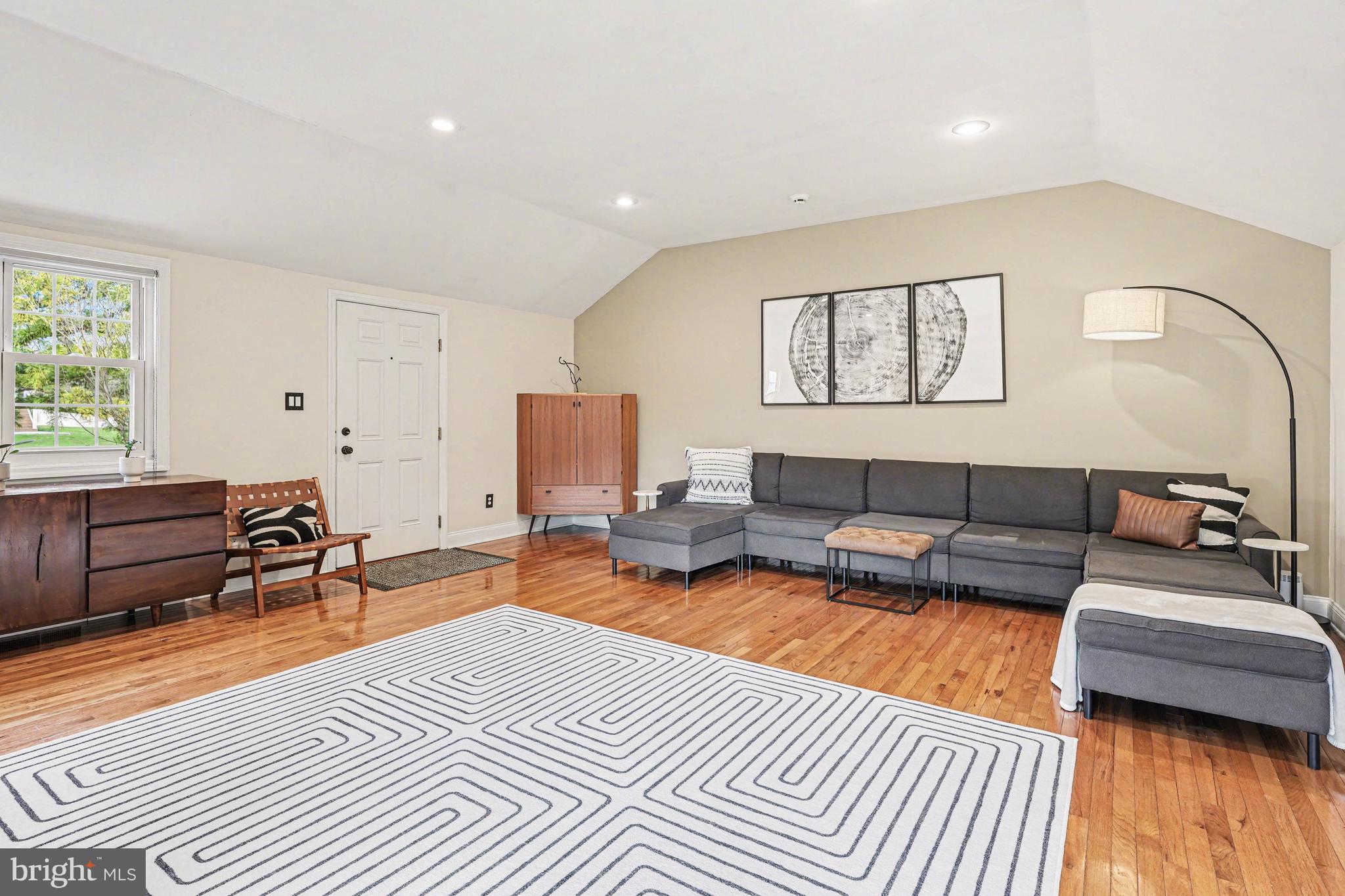 1408 Evans Road Ambler, PA 19002 - Photo 27 of 61 a living room with furniture and a couch