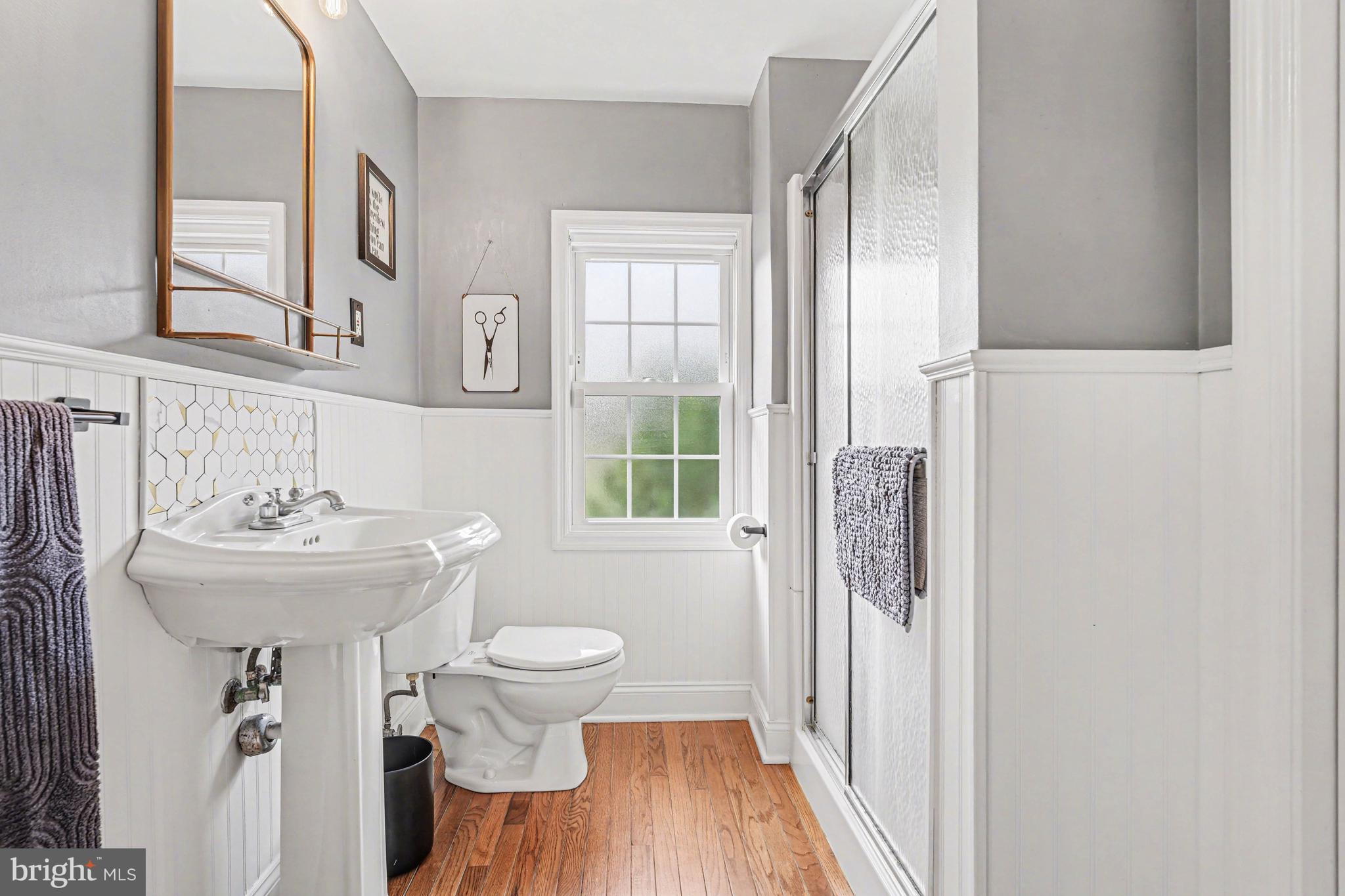 1408 Evans Road Ambler, PA 19002 - Photo 38 of 61 a bathroom with a sink toilet and a mirror