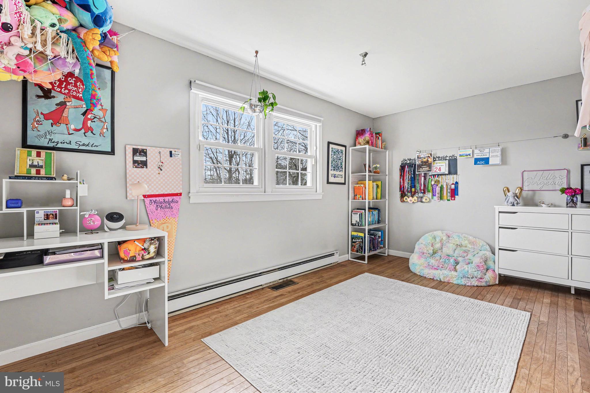 1408 Evans Road Ambler, PA 19002 - Photo 40 of 61 a bedroom with furniture and a wooden floor