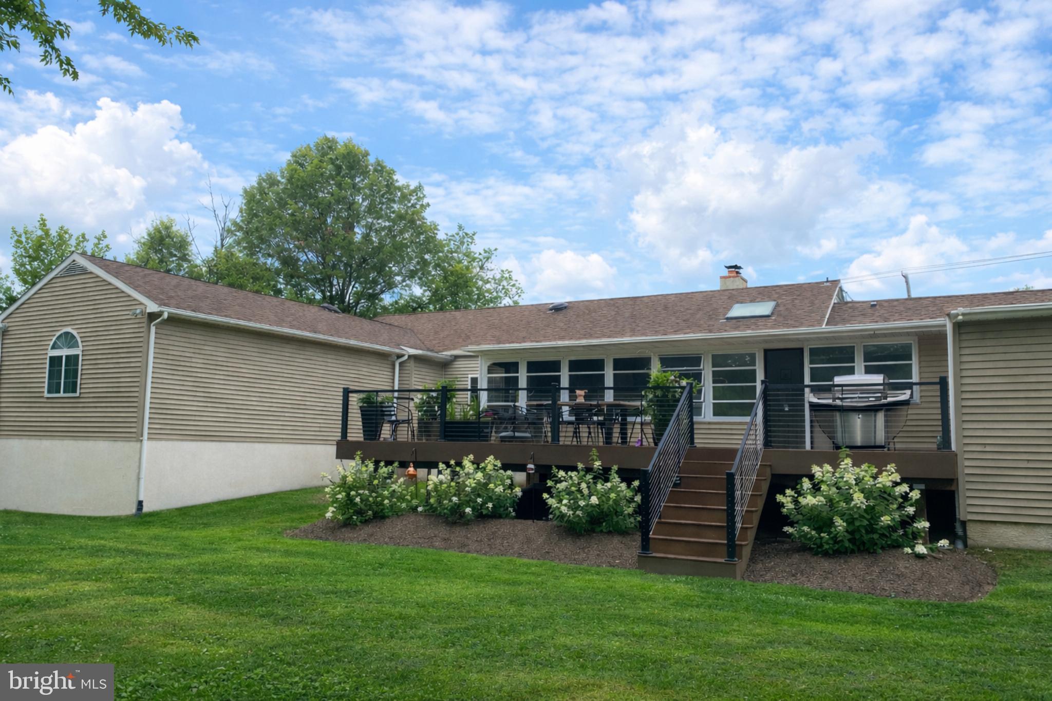 1408 Evans Road Ambler, PA 19002 - Photo 47 of 61 a front view of a house with garden