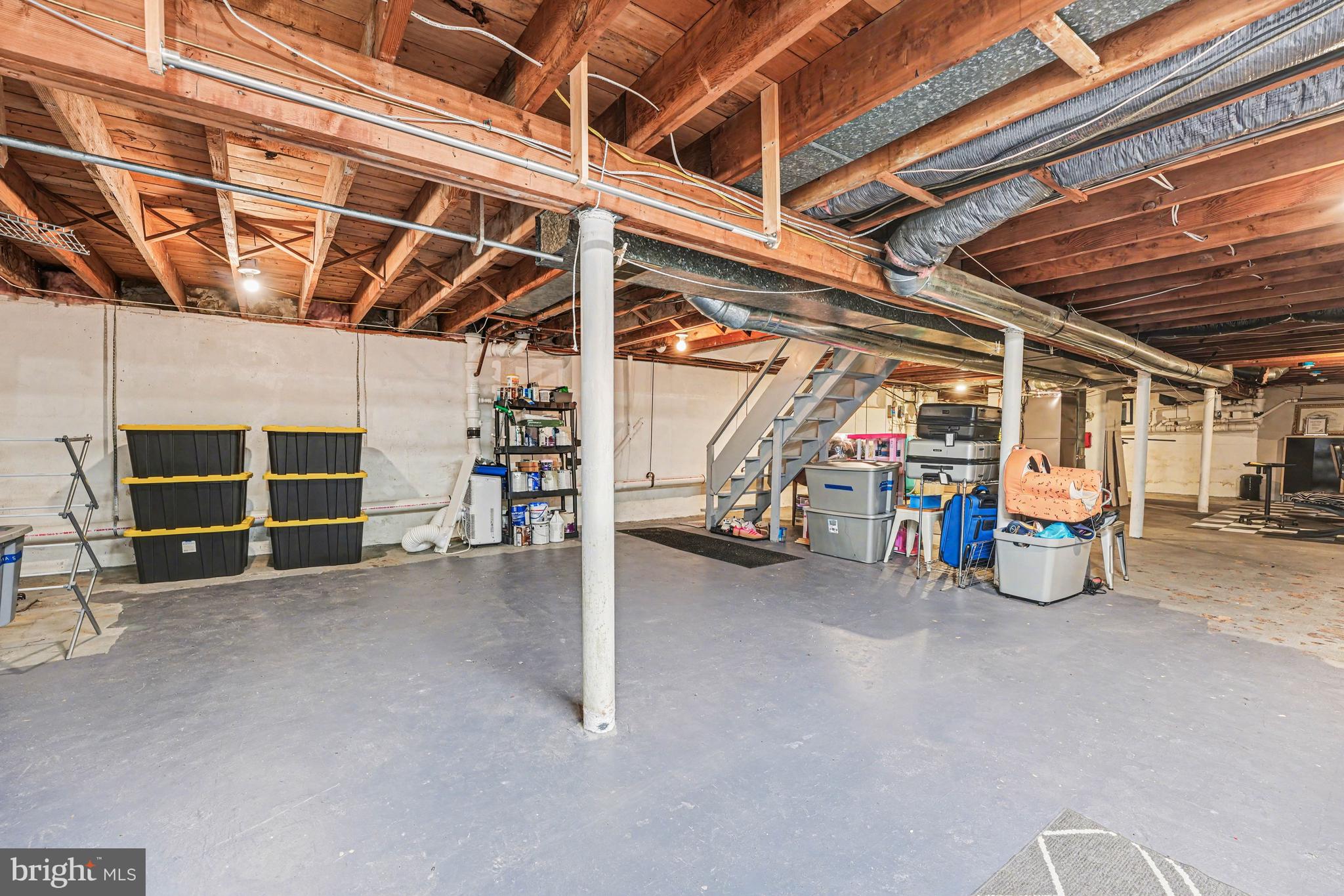 1408 Evans Road Ambler, PA 19002 - Photo 49 of 61 a view of a big room with air conditioner duct and materials on floor
