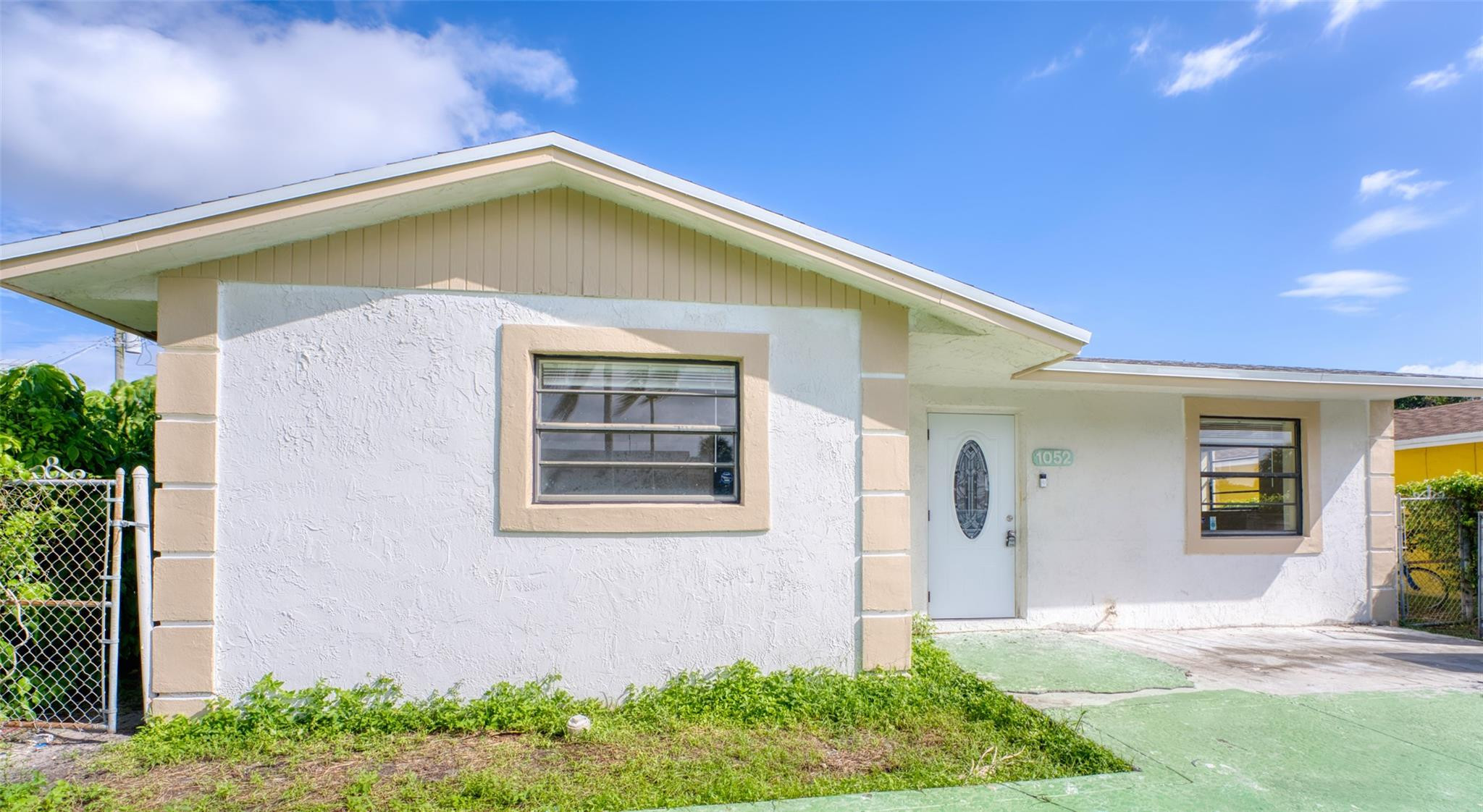 1052 West 6th Street Riviera Beach, FL 33404 - Photo 1 of 24 Photo 1