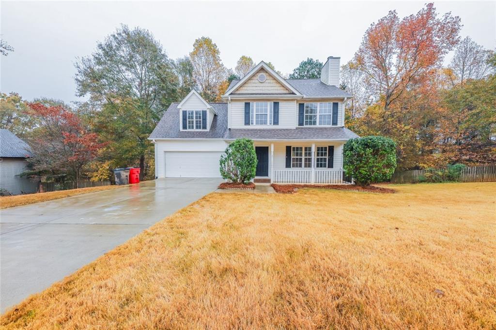 831 Eastmont Road Winder, GA 30680 - Photo 1 of 1 View of front of home with a front lawn and a porch