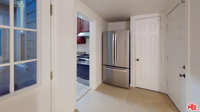 a view of a backyard with plants and flowers