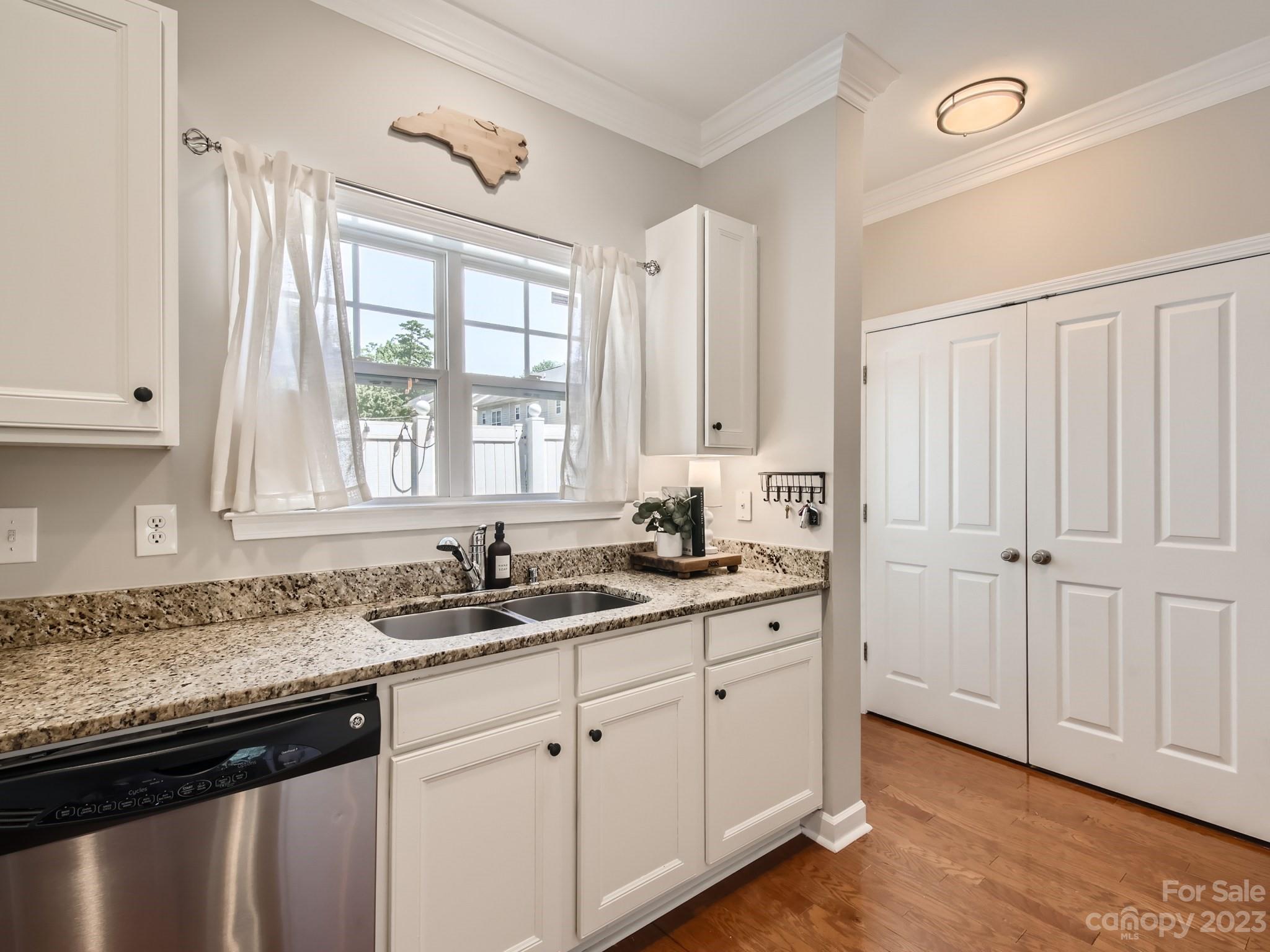 831 Millbrook Road Charlotte, NC 28211 - Photo 12 of 33 a kitchen with a sink and cabinets