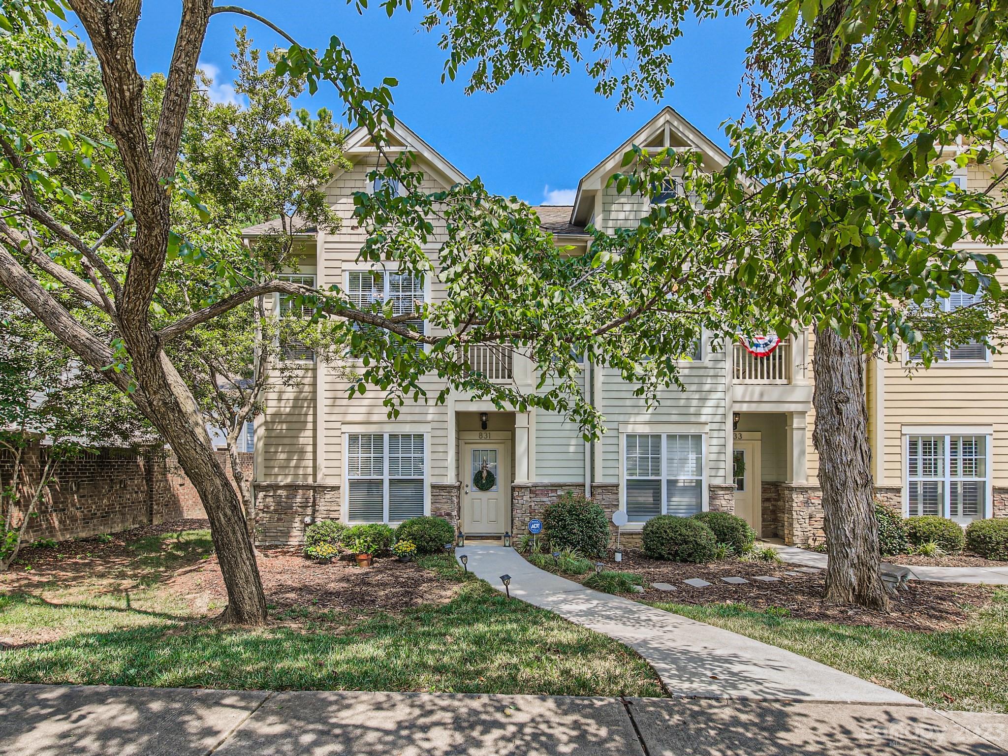 831 Millbrook Road Charlotte, NC 28211 - Photo 32 of 33 front view of a house with a tree