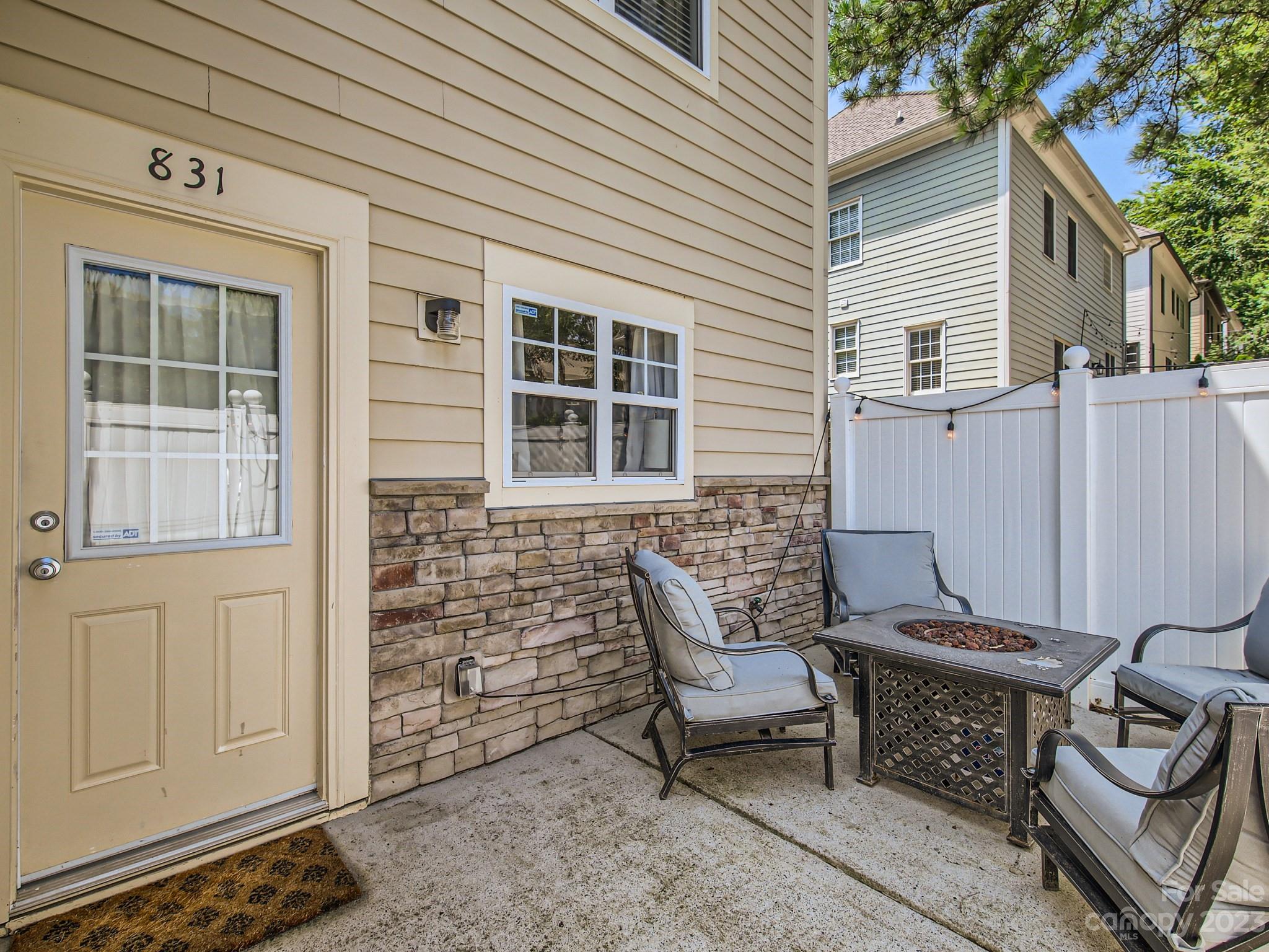 831 Millbrook Road Charlotte, NC 28211 - Photo 7 of 33 a view of a entryway with wooden walls