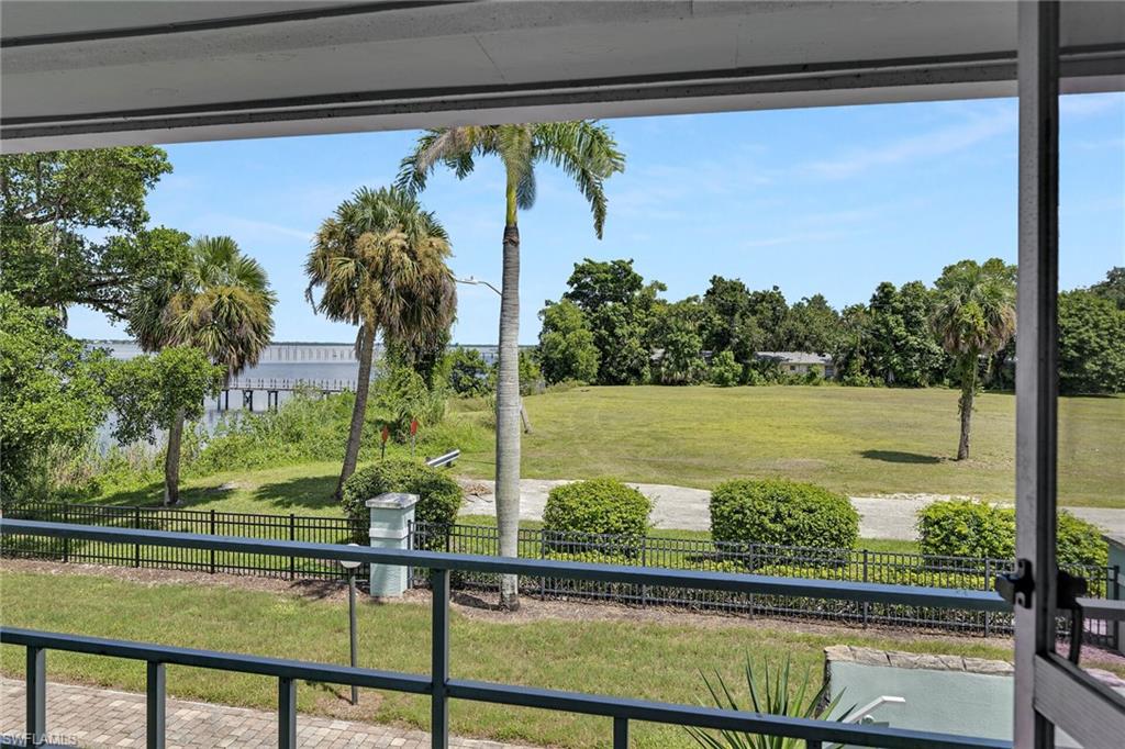 3225 East Riverside Drive Fort Myers, FL 33916 - Photo 13 of 33 a view of swimming pool from a window