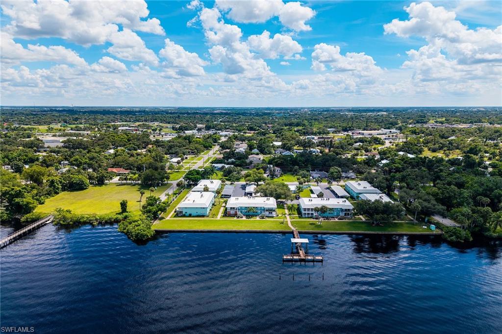 3225 East Riverside Drive Fort Myers, FL 33916 - Photo 26 of 33 a view of a swimming pool with an ocean view