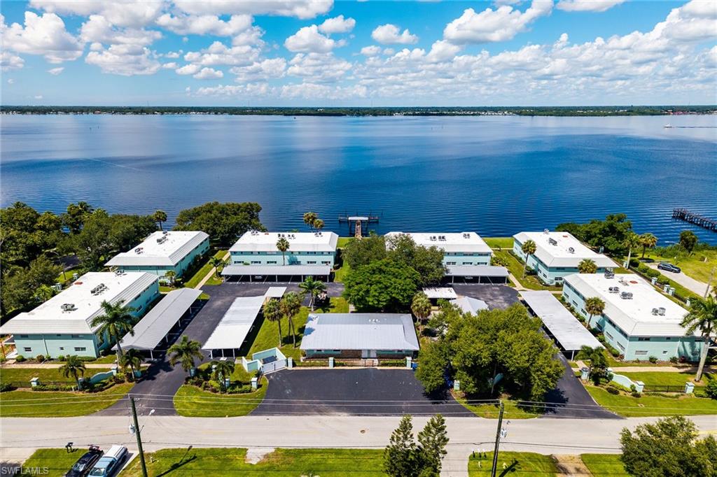 3225 East Riverside Drive Fort Myers, FL 33916 - Photo 29 of 33 an aerial view of residential houses with outdoor space
