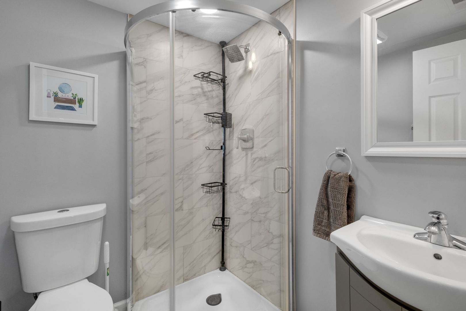 16446 West 147th Place Lockport, IL 60441 - Photo 12 of 22 a bathroom with a toilet sink and shower