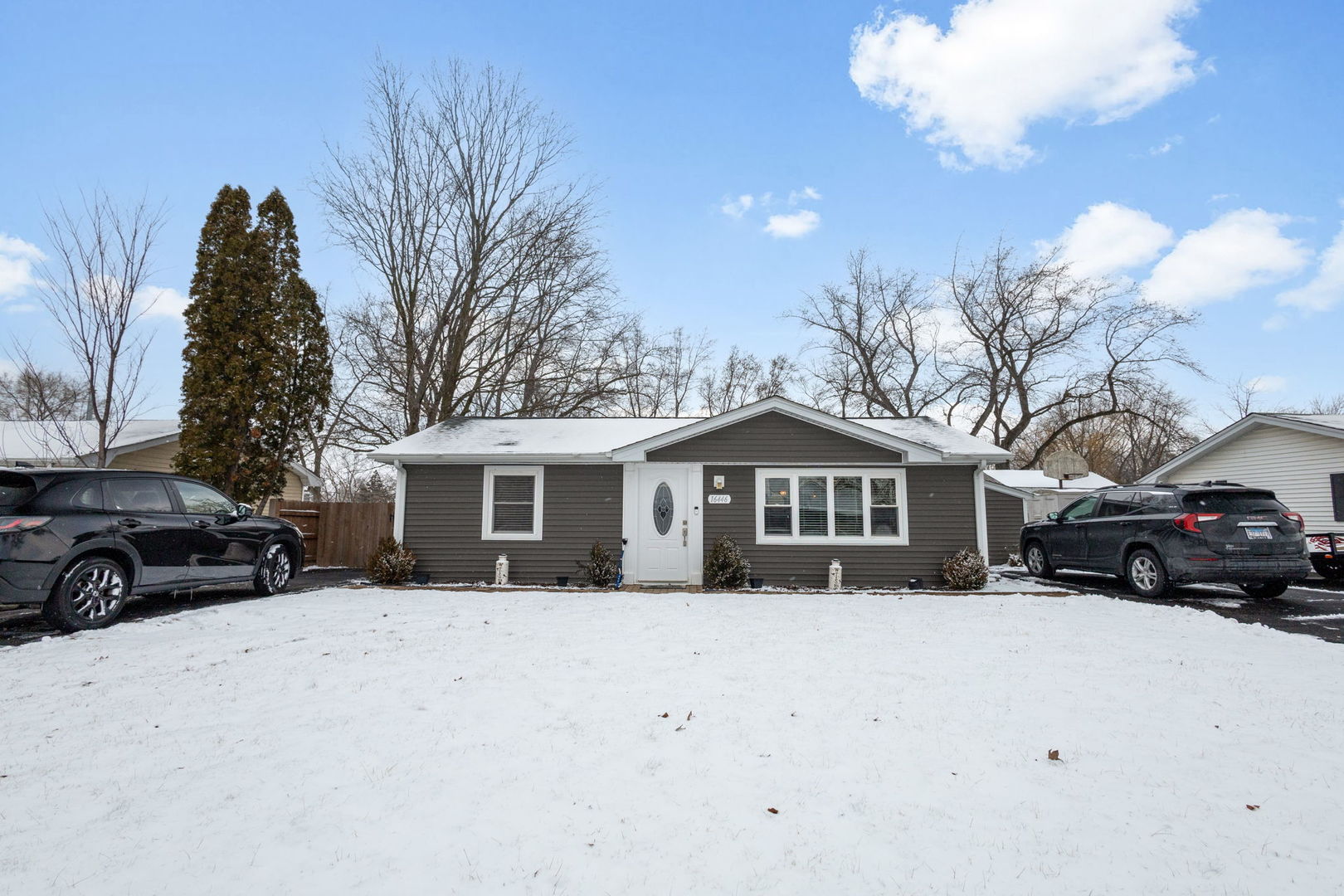 16446 West 147th Place Lockport, IL 60441 - Photo 17 of 22 a view of house with a yard covered in snow