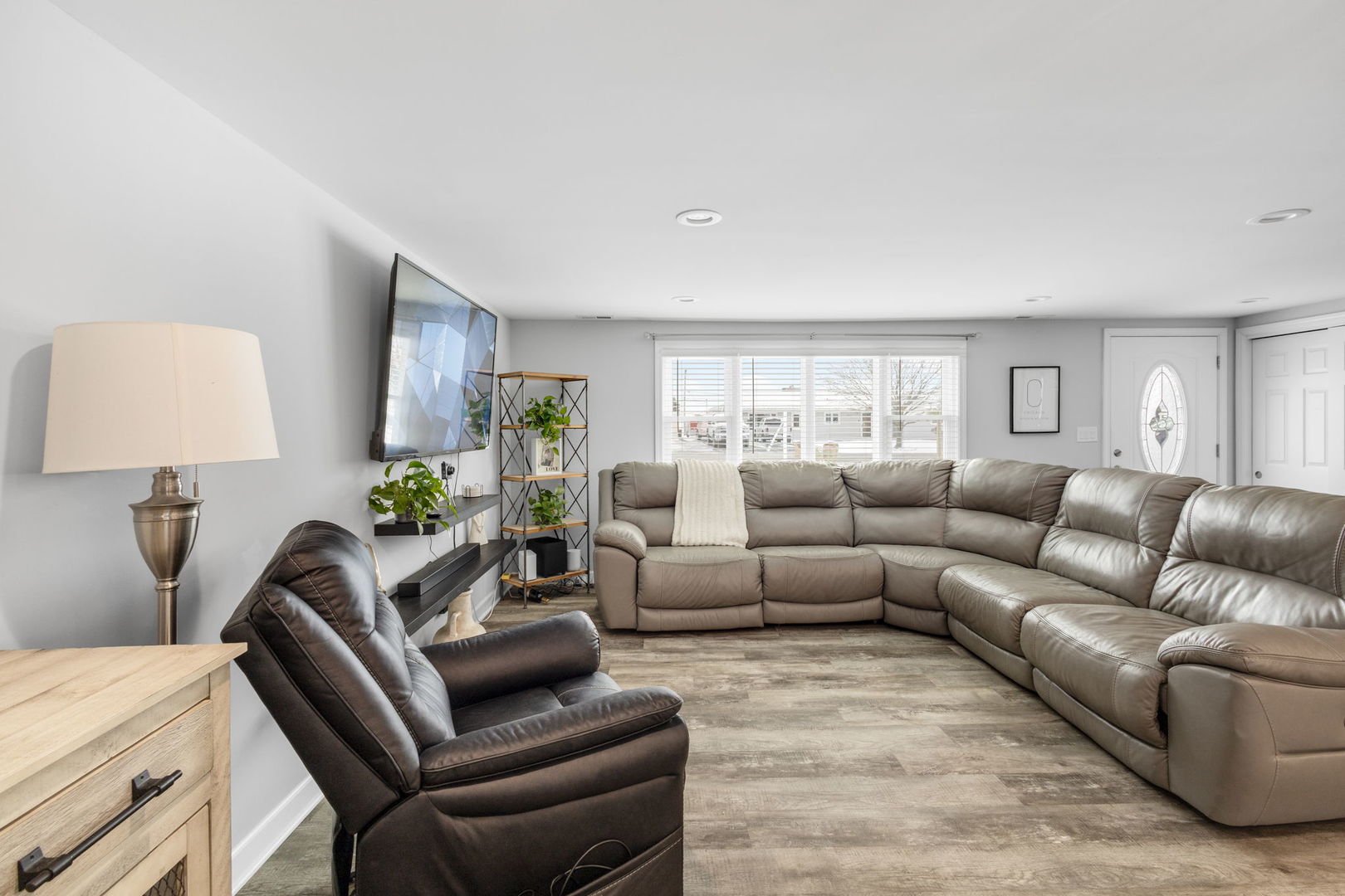 16446 West 147th Place Lockport, IL 60441 - Photo 4 of 22 a living room with furniture and a lamp