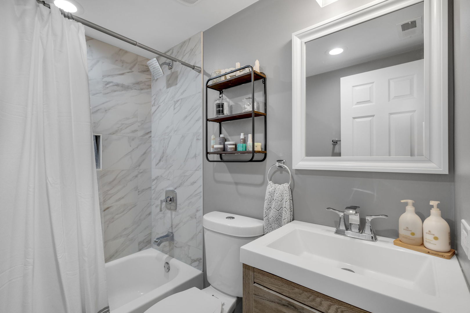 16446 West 147th Place Lockport, IL 60441 - Photo 9 of 22 a bathroom with a sink toilet and shower