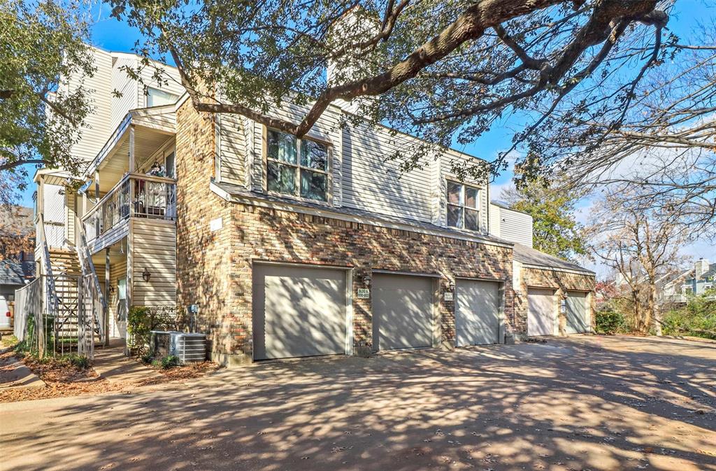 7340 Skillman Street, Unit 803 Dallas, TX 75231 - Photo 1 of 1 a view of a house with a yard