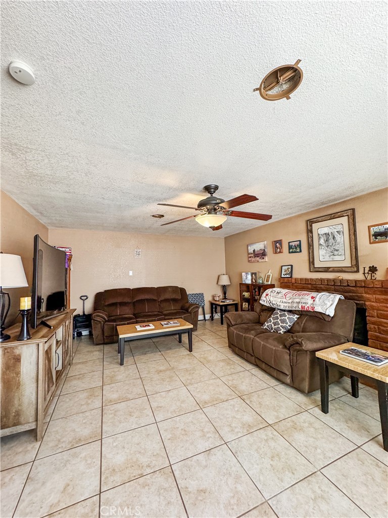741 Ocotillo Road Blythe, CA 92225 - Photo 4 of 19 a living room with furniture and a ceiling fan