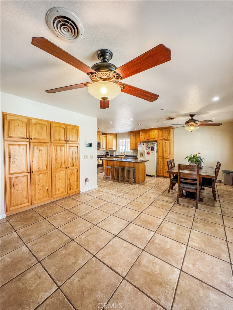 741 Ocotillo Road Blythe, CA 92225 - Photo 10 of 19 a view of a livingroom with furniture and a ceiling fan