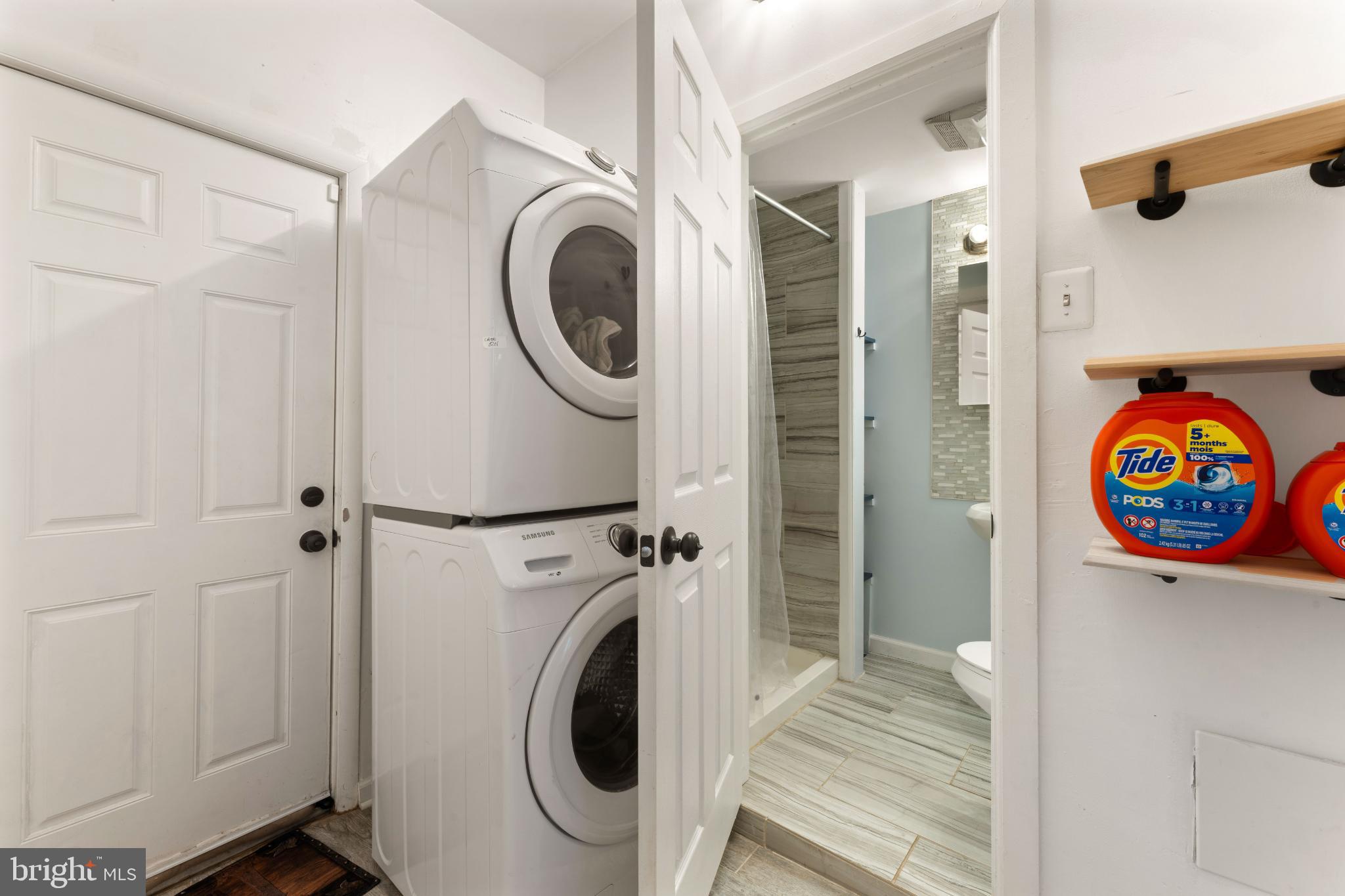 4618 Smick Street Philadelphia, PA 19127 - Photo 16 of 32 a view of a hallway with washer and dryer