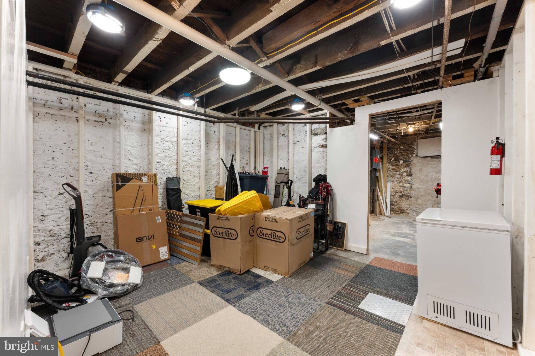 4618 Smick Street Philadelphia, PA 19127 - Photo 29 of 32 a living room with furniture and a window