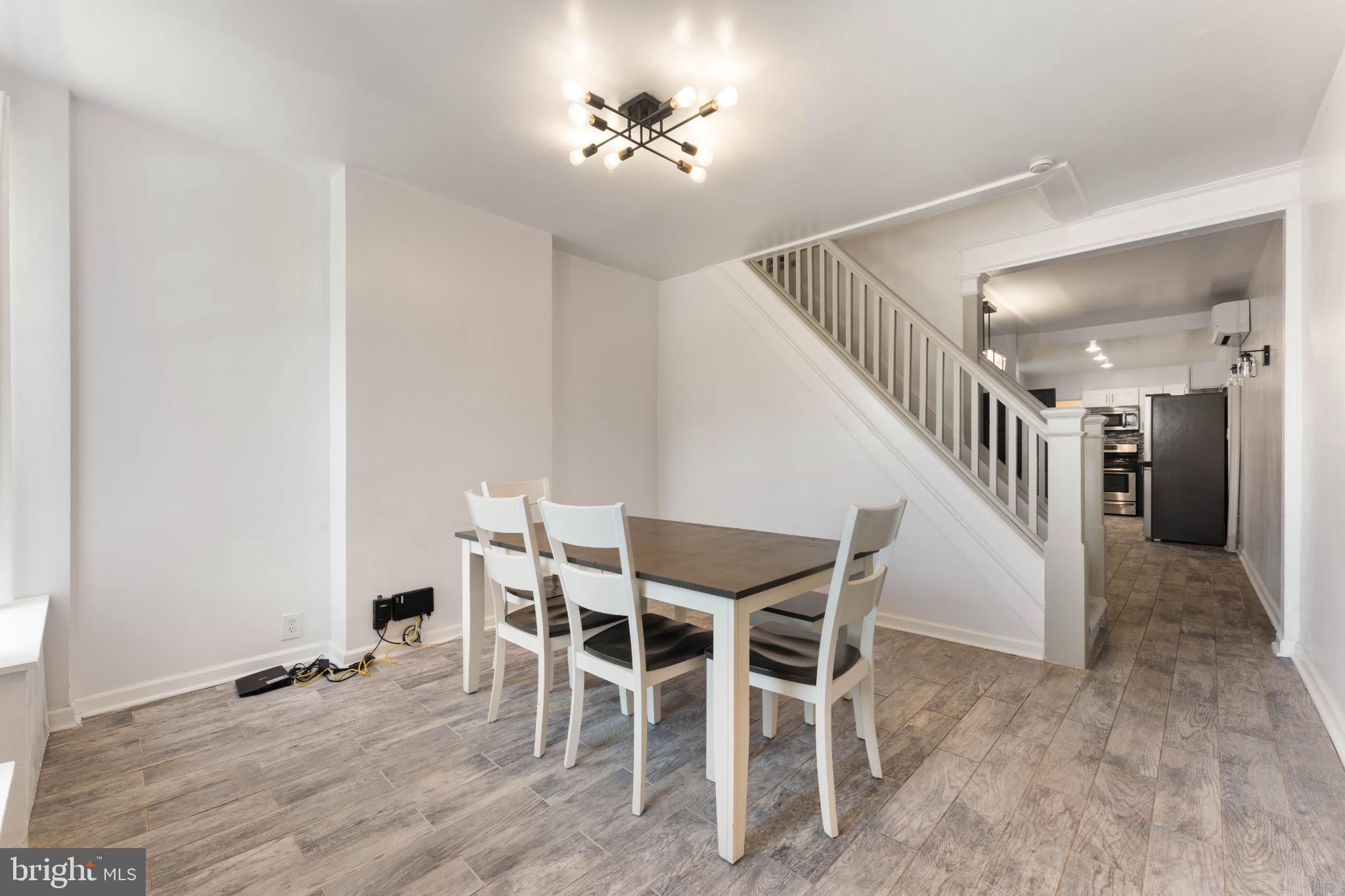 4618 Smick Street Philadelphia, PA 19127 - Photo 5 of 32 a view of a livingroom with furniture and stairs