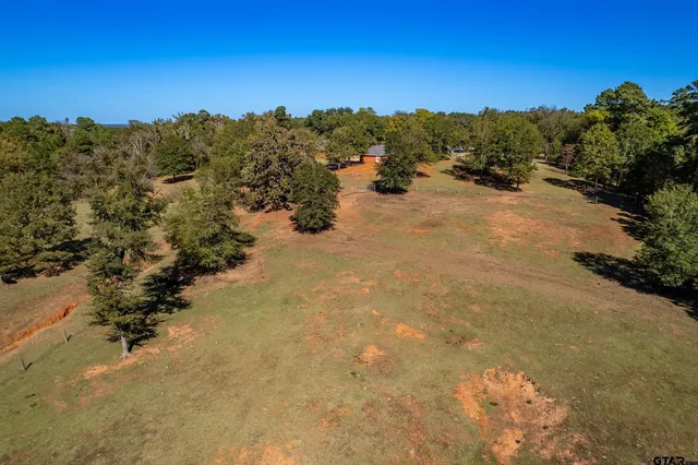 a view of a beach with a mountain in the background