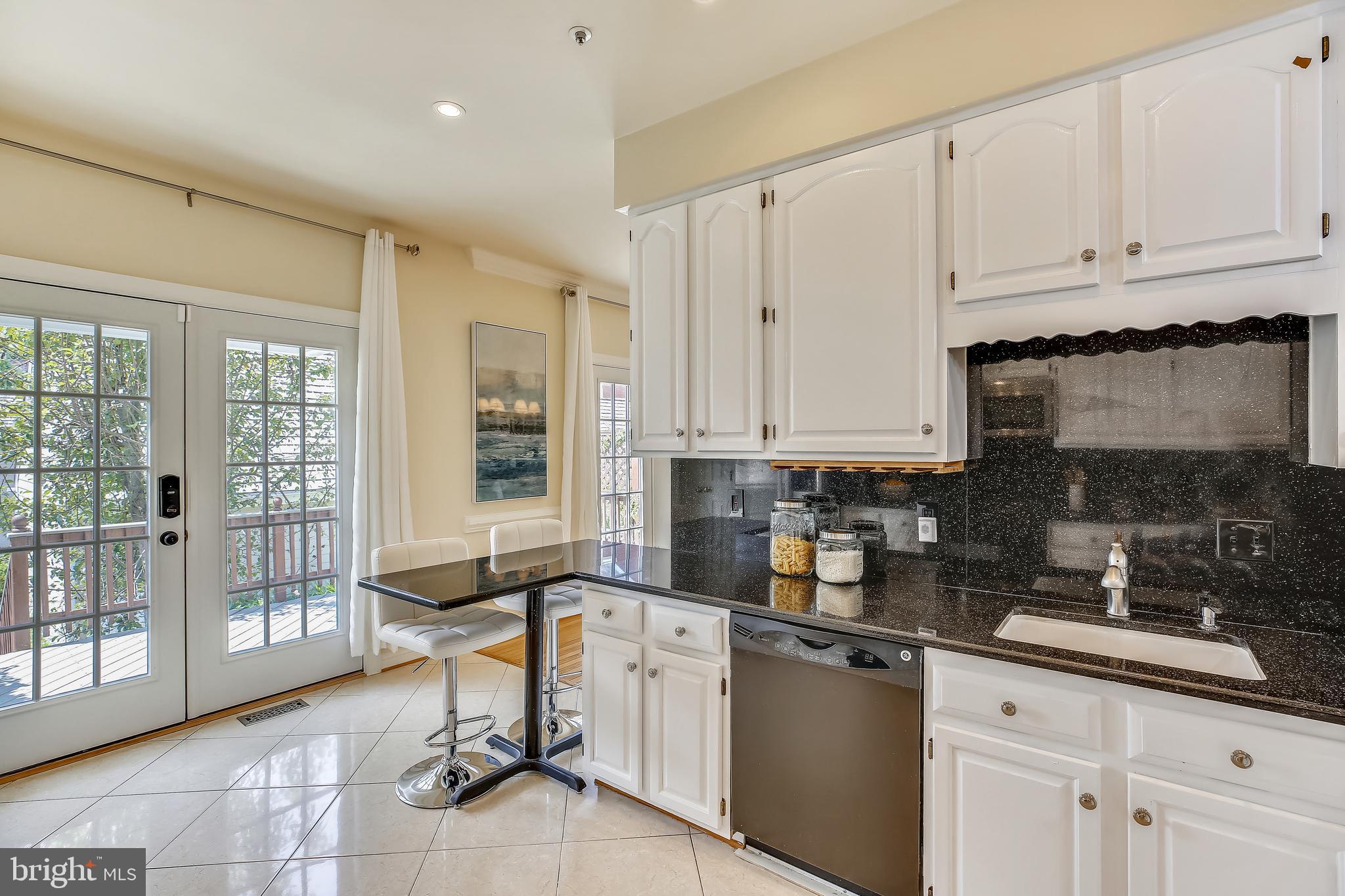 520 Tschiffely Square Road Gaithersburg, MD 20878 - Photo 11 of 39 Kitchen offers access to deck