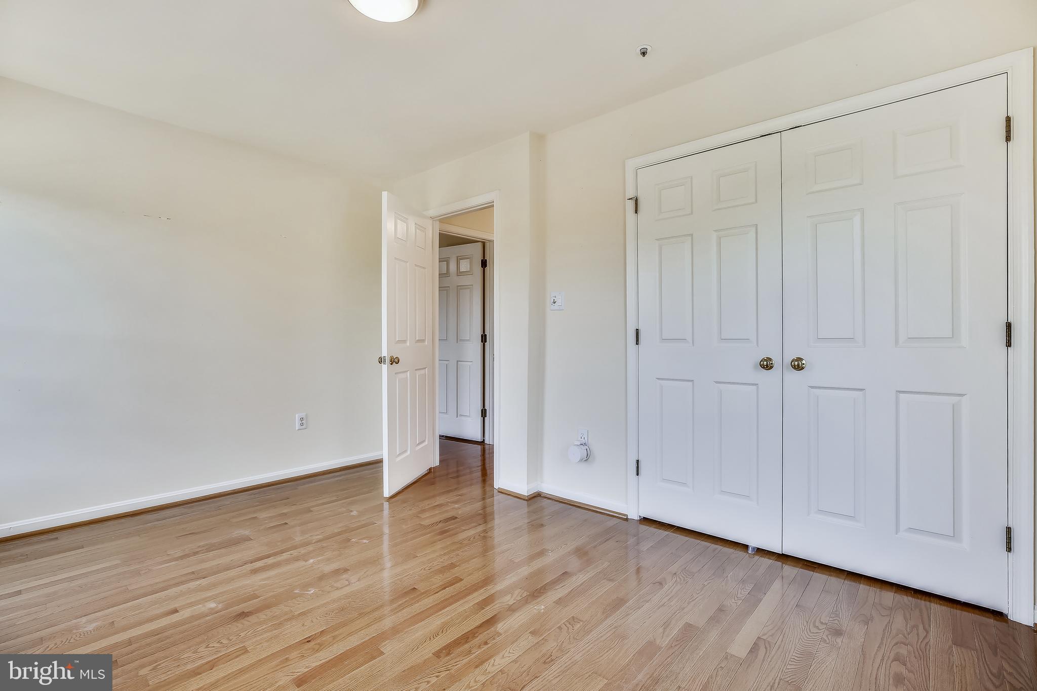 520 Tschiffely Square Road Gaithersburg, MD 20878 - Photo 21 of 39 Second bedroom has double-door closet