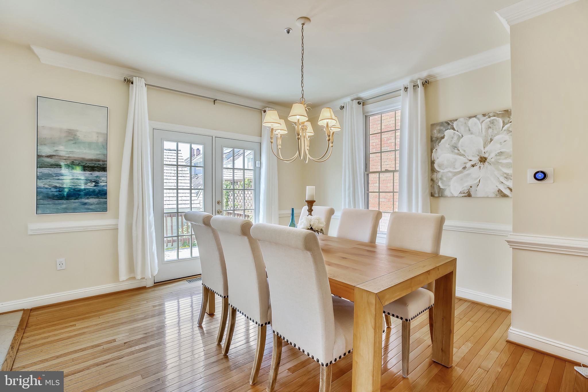 Spacious formal dining room w/doors to deck