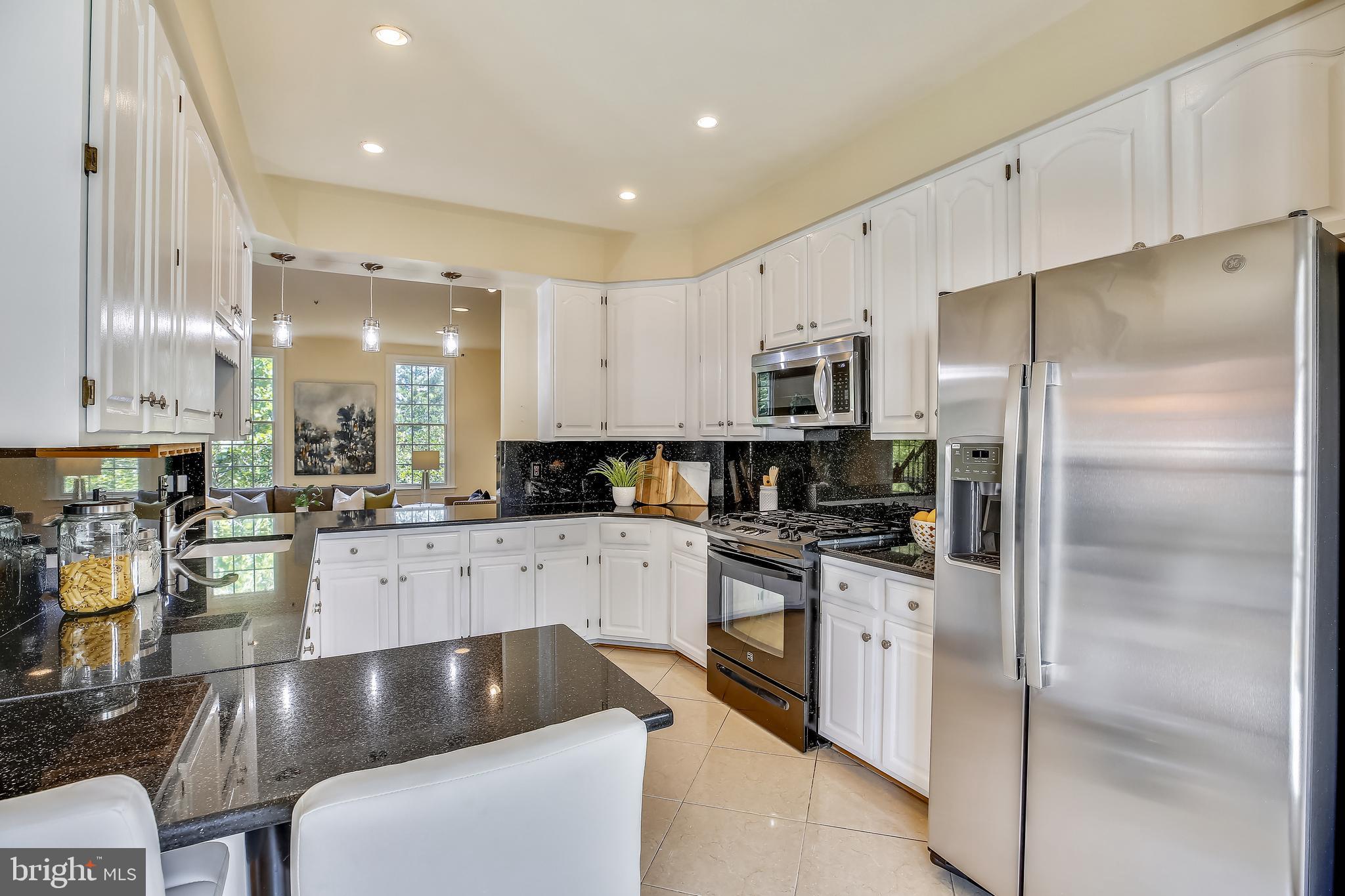 520 Tschiffely Square Road Gaithersburg, MD 20878 - Photo 10 of 39 Updated kitchen sparkles w/granite & stainless