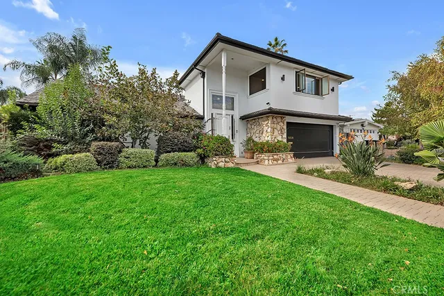 a front view of a house with patio