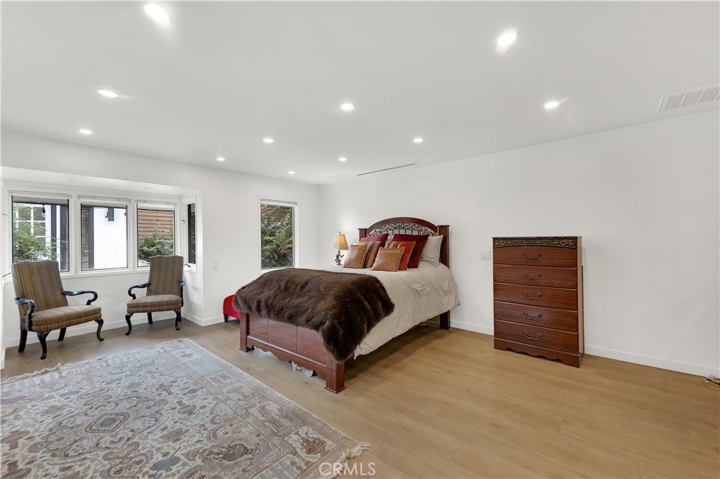 6409 Graves Avenue Lake Balboa, CA 91406 - Photo 23 of 50 a bedroom with a bed and window