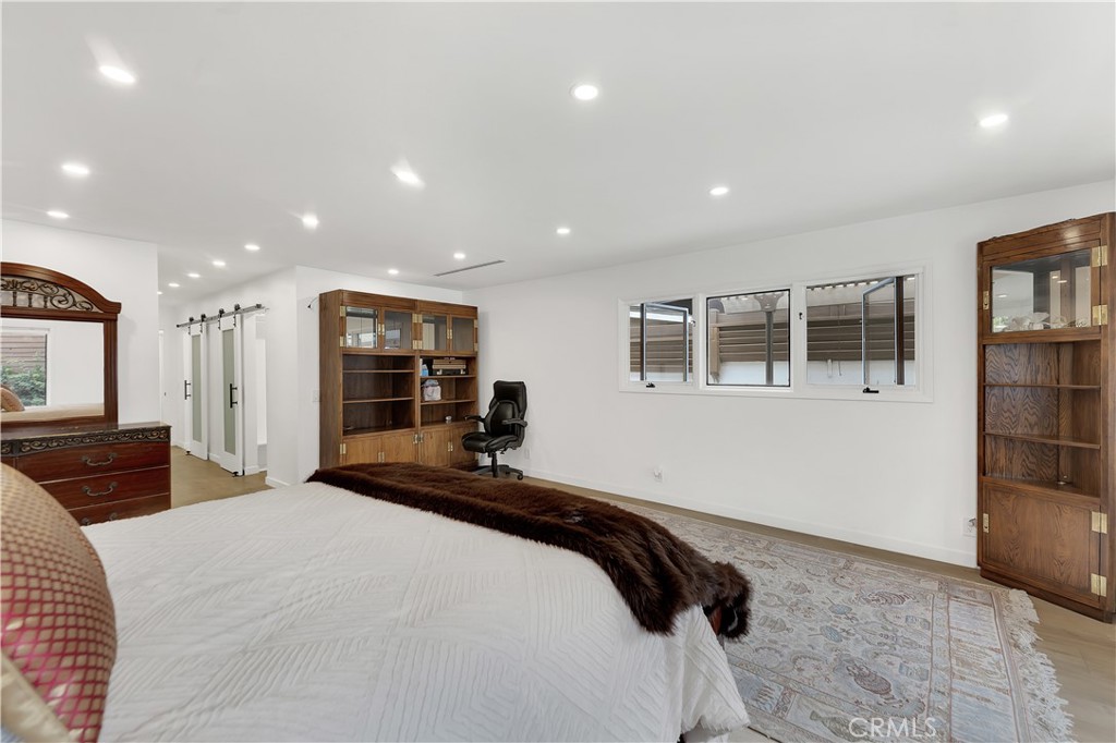 6409 Graves Avenue Lake Balboa, CA 91406 - Photo 25 of 50 a bedroom with a bed and a view of kitchen