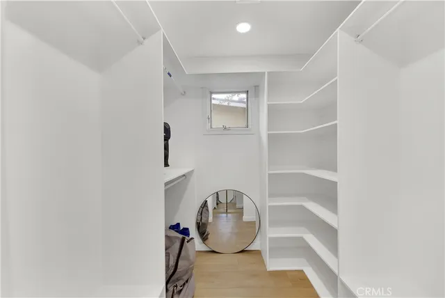 a view of a hallway with closet