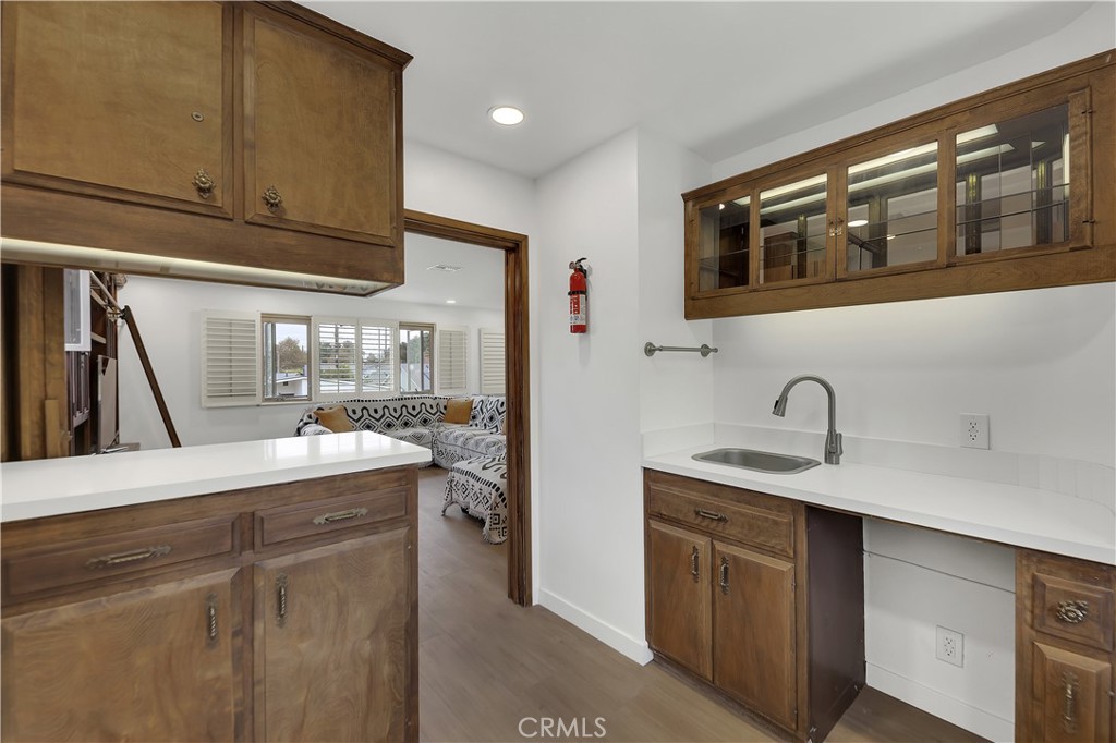 6409 Graves Avenue Lake Balboa, CA 91406 - Photo 31 of 50 a kitchen with a sink and cabinets