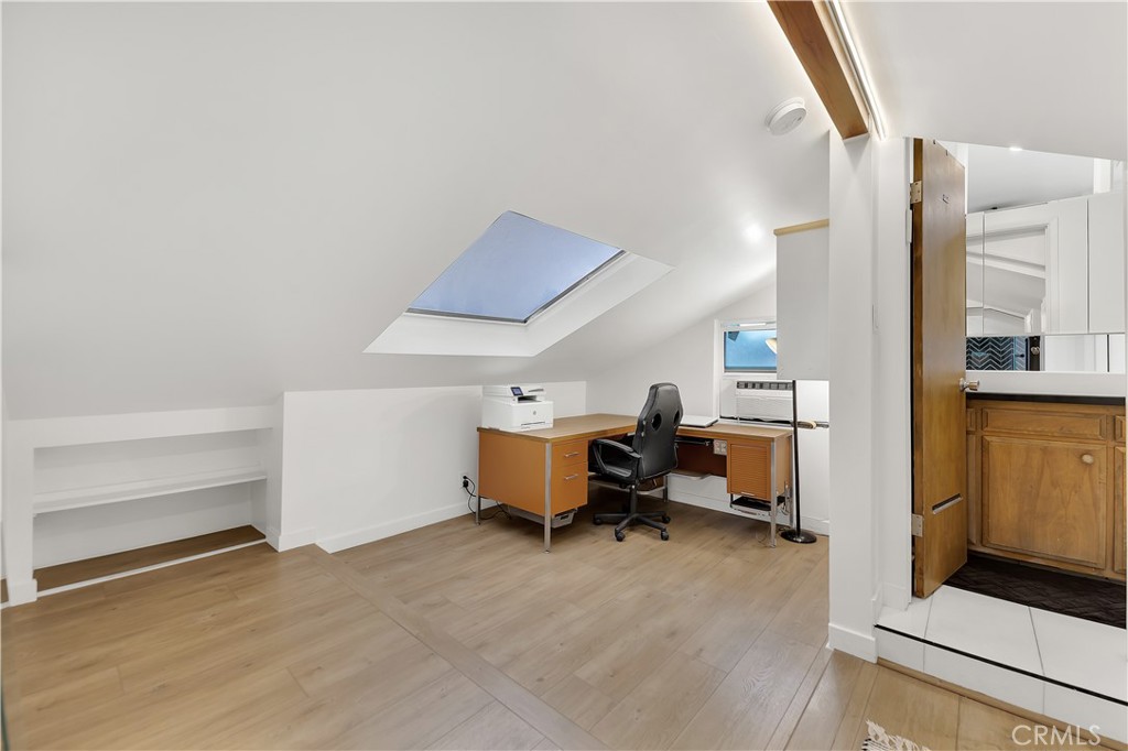 6409 Graves Avenue Lake Balboa, CA 91406 - Photo 37 of 50 a view of a livingroom with furniture and a window