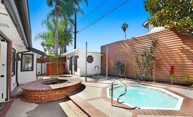 a front view of a house with entertaining space