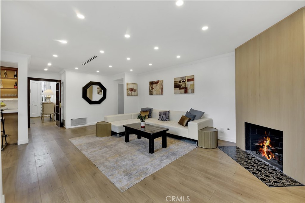 6409 Graves Avenue Lake Balboa, CA 91406 - Photo 6 of 50 a living room with furniture and a fireplace