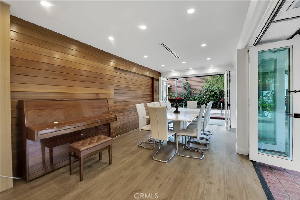 6409 Graves Avenue Lake Balboa, CA 91406 - Photo 10 of 50 a dining room with furniture and wooden floor