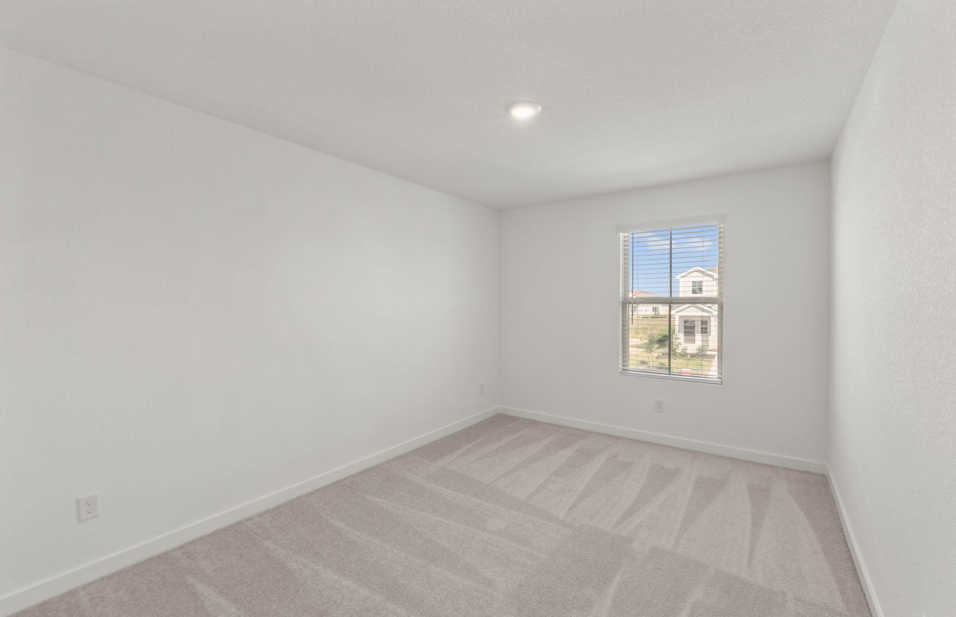590 Rubber Tree Way Buda, TX 78610 - Photo 16 of 22 an empty room with a window