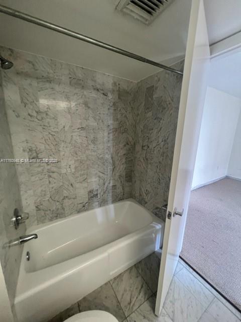 600 Grapetree Drive, Unit 6ES Key Biscayne, FL 33149 - Photo 15 of 21 a bathroom with a bathtub and a shower