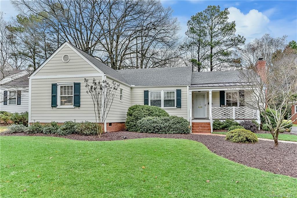 1028 Sedgefield Road Charlotte, NC 28209 - Photo 1 of 24 a front view of a house with a yard