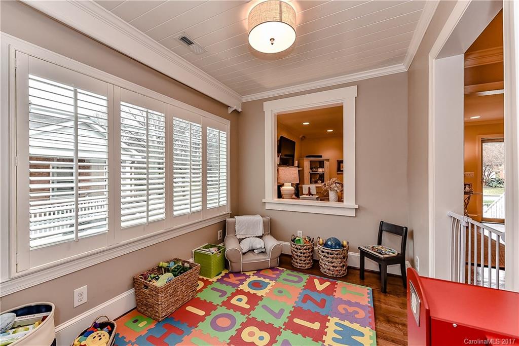 1028 Sedgefield Road Charlotte, NC 28209 - Photo 11 of 24 a bedroom with furniture and a window