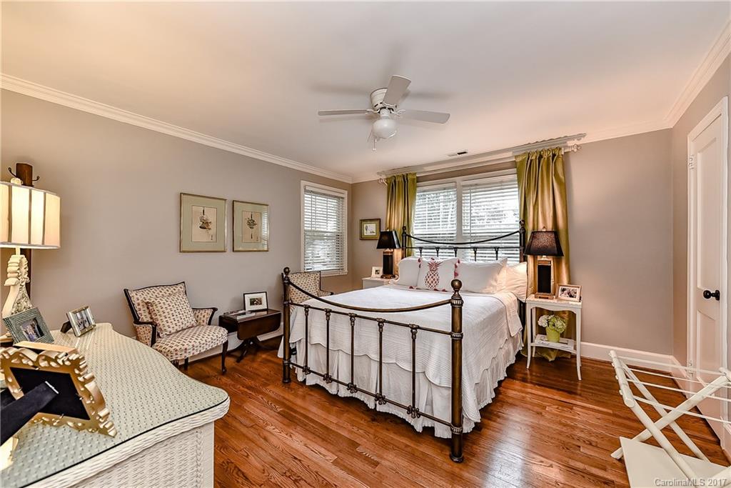 1028 Sedgefield Road Charlotte, NC 28209 - Photo 13 of 24 a bed room with a bed and a window