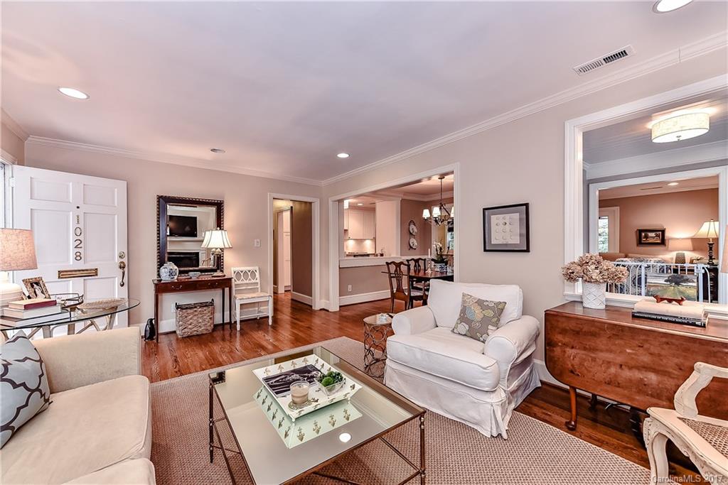 1028 Sedgefield Road Charlotte, NC 28209 - Photo 3 of 24 a living room with furniture wooden floor and a table