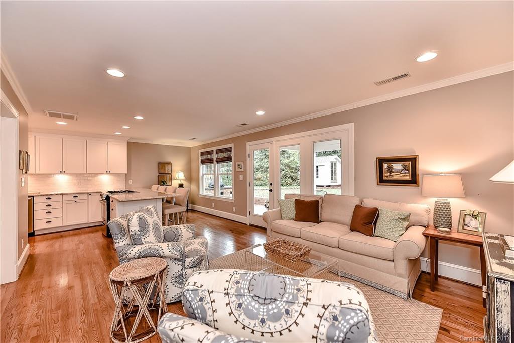 1028 Sedgefield Road Charlotte, NC 28209 - Photo 5 of 24 a living room with furniture and a wooden floor