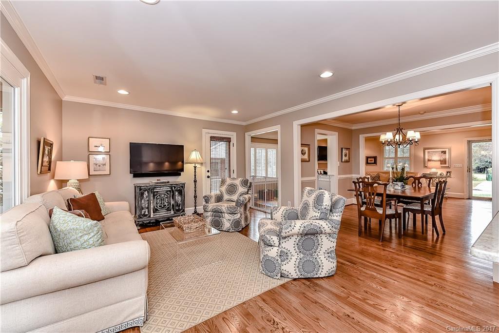 1028 Sedgefield Road Charlotte, NC 28209 - Photo 9 of 24 a living room with furniture and a flat screen tv